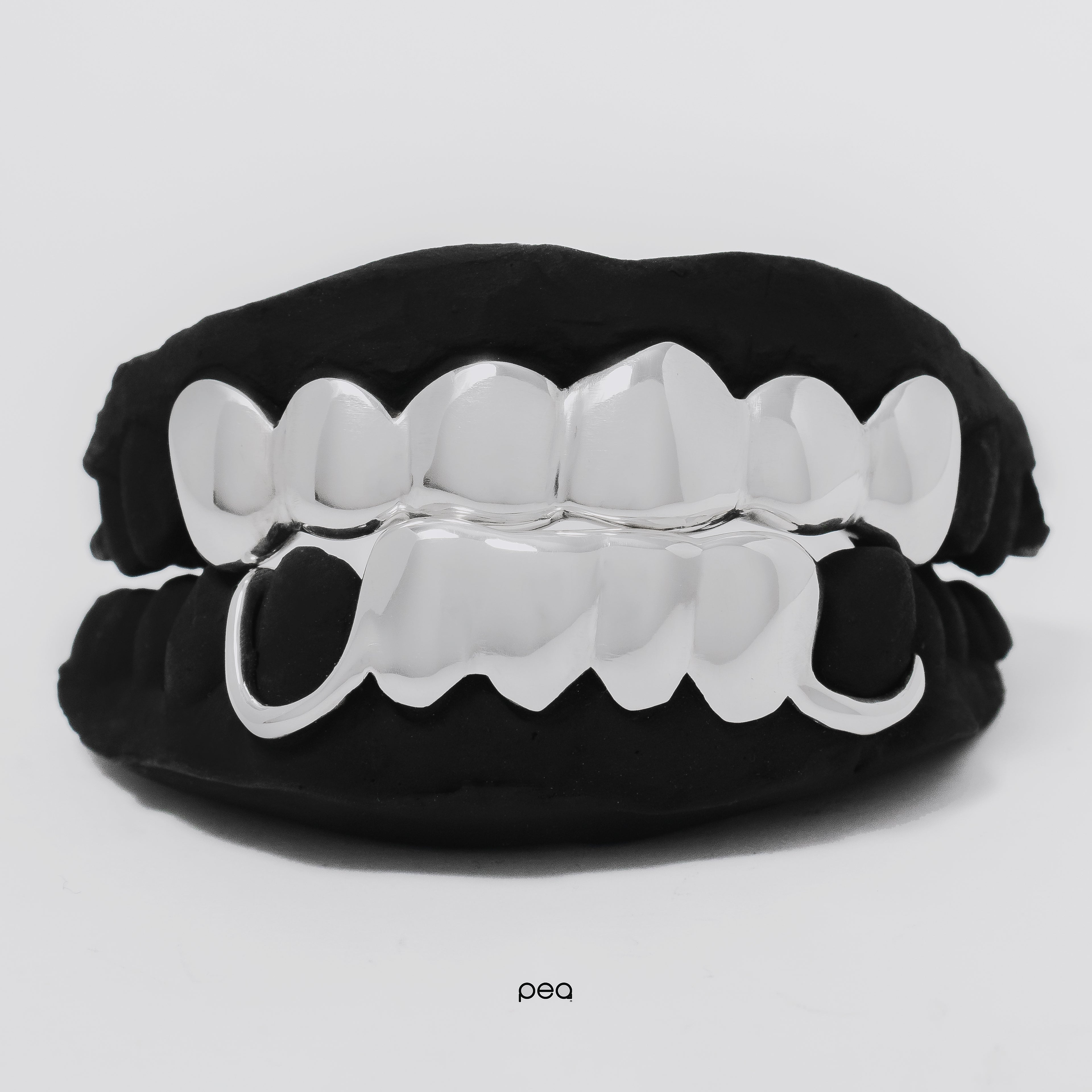 12 Teeth (6 top + 6 bottom)